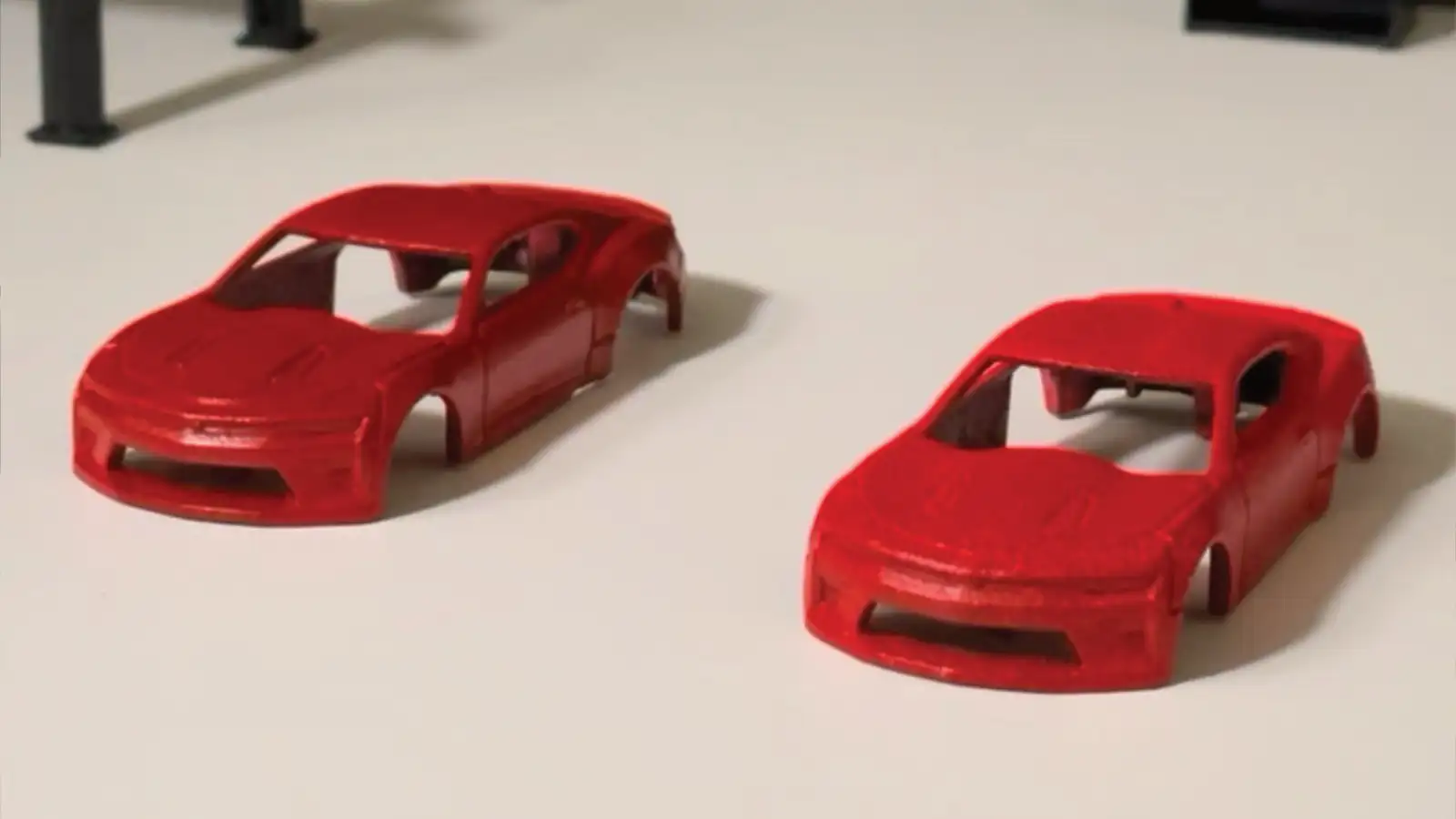 Custom die-cast Camaro model cars with paint, tools, wheels and workshop details